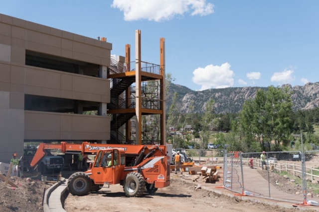 Install of the timber frame porte cochere in Estes Park